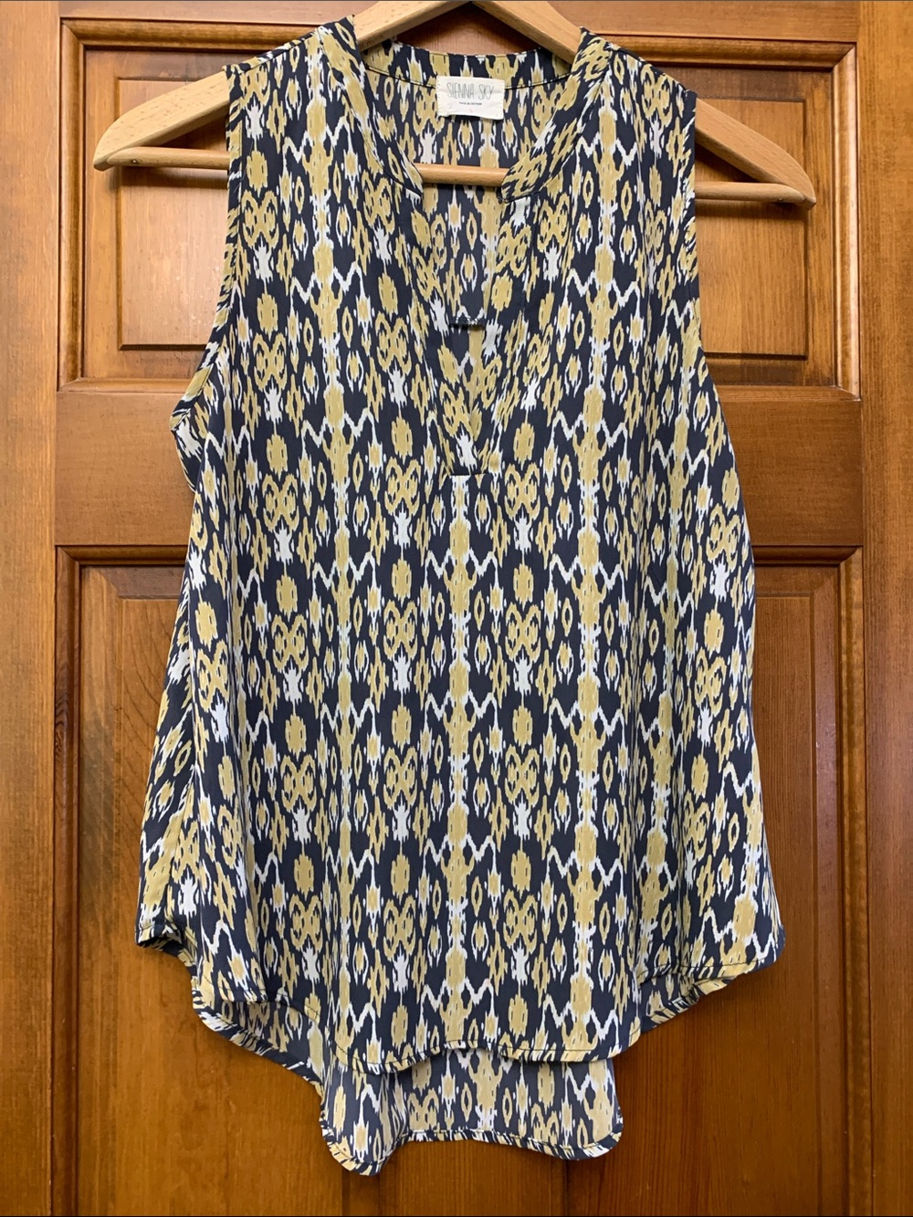 Sienna Sky Sleeveless Ikat-Print V-Neck Blouse in Navy and Mustard